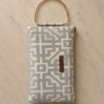 Geometric light patterned prayer bag with gold handle