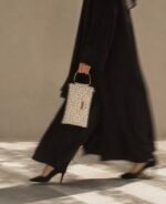 Geometric light patterned prayer bag with gold handle - Image 2