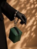 Mini green prayer bag with silver handle
