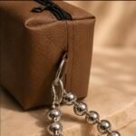Mini brown prayer bag with silver handle